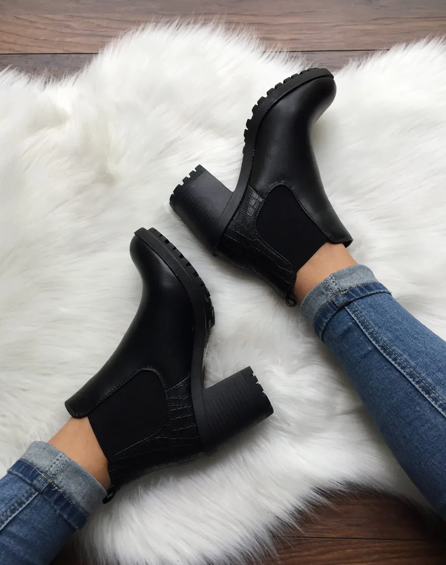 Chelsea boots noires à talon et effet croco